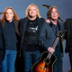 The surviving Eagles with Jackson Browne at the Grammys' Glenn Frey tribute (Photo: Lester Cohen/Getty Images)